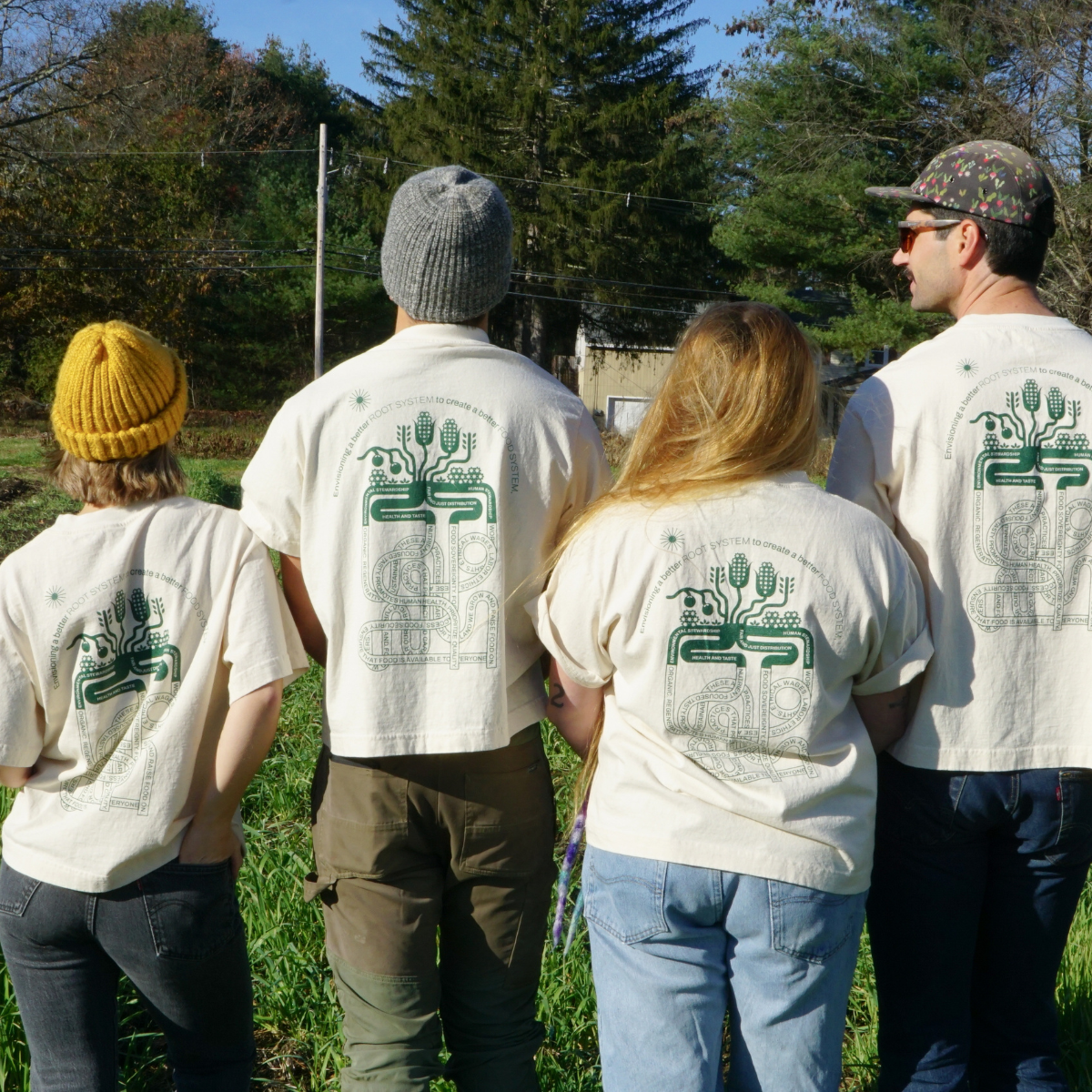 Group of people wearing COSAP tees,  Reclaimed Cotton Tshirt, COSAP Co-op Community Supported Apparel Tee tshirt, mission based tshirt